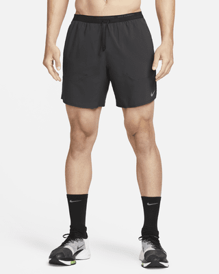 Nike Nike StridePantalón corto de running Dri-FIT de 18 cm con malla interior - Hombre Envío internacional gratuito
