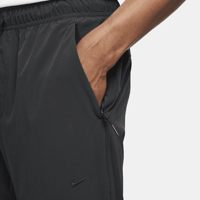 Nike Nike UnlimitedPantalón versátil con bajos con cremallera Dri-FIT ADV - Hombre Mejor oferta