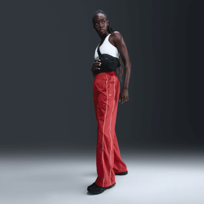 Nike Nike WindrunnerPantalón de talle alto y tejido Woven con dobladillo abierto - Mujer Última moda