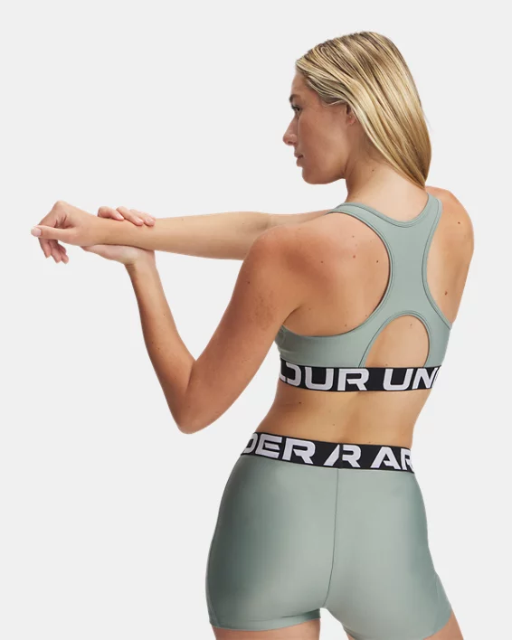 Under Armour Sujetador deportivo HeatGear® Armour Mid Branded para mujer   Gran oferta