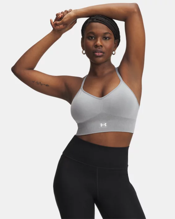 Under Armour Sujetador deportivo de sujeción baja sin costuras y de efecto lavado UA Vanish para mujer   Rebajas