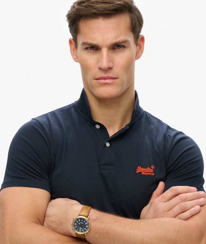 superdry Polo de punto fluorescente con logotipo Essential Promoción trimestral
